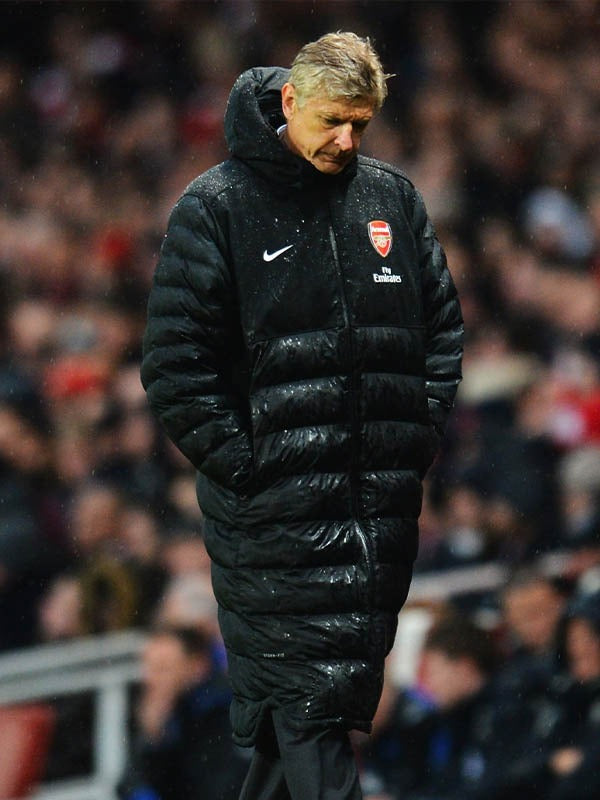 Men’s long black quilted puffer coat featuring high collar and warm insulation